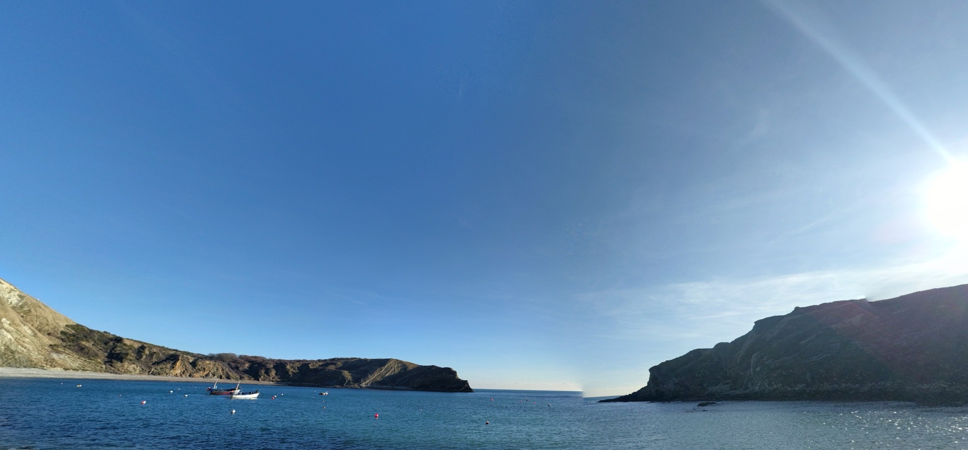 Lulworth Cove on a sunny day