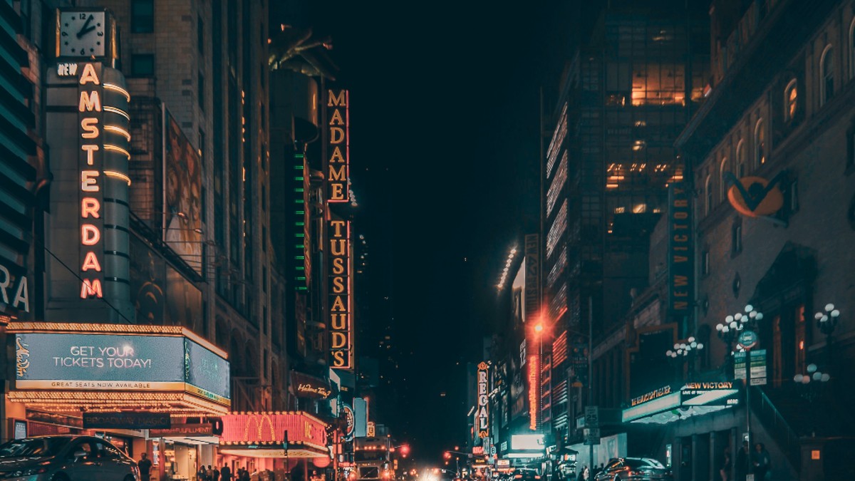 An outside shot of the street with the New Amsterdam Theatre